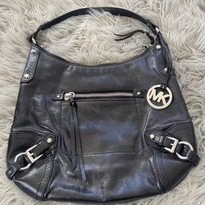 Michael Kors women’s black leather handbag